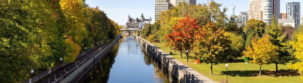 Rideau Canal in Ottawa, Canada during the autumn season with fall trees.
